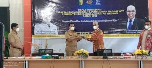Plt Bupati Kuansing Terima Piagam WTP dari DJPb Riau