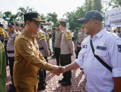 Bupati Iskandarsyah Pimpin Apel Satkamling di Polres Karimun